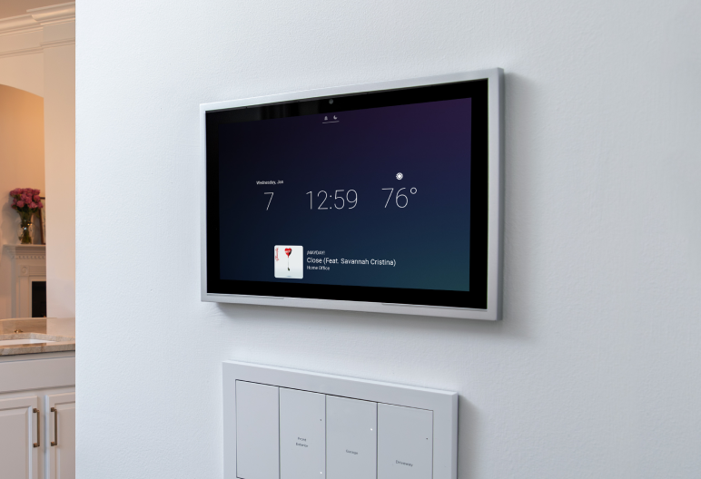 Control4 touchscreen and keypad on a wall