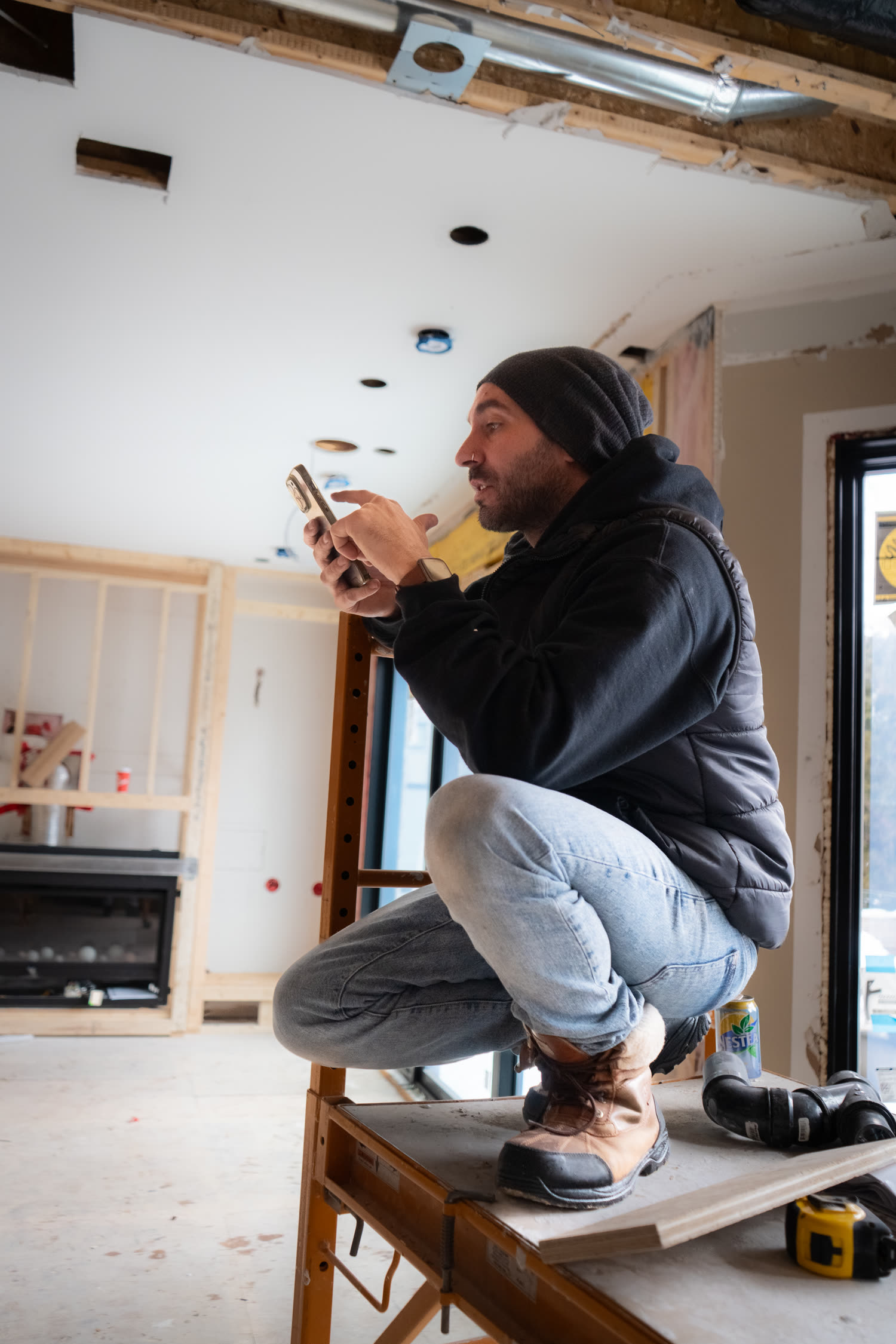 AVAS technician installing recessed lighting and wiring