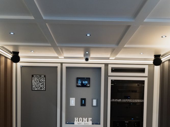 Ceiling security camera above the Control4 control wall inside the AVAS trailer