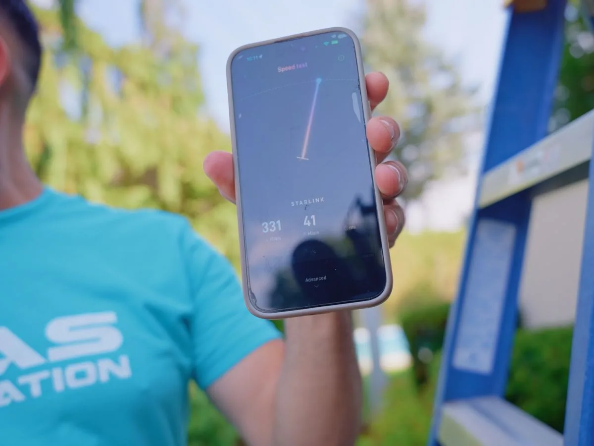 A phone showing a speed test result after the Starlink install